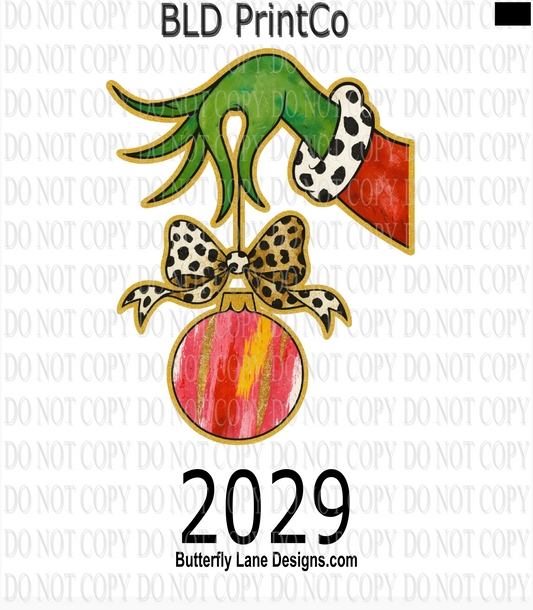 D2029 Moody green hand with Christmas bulb
